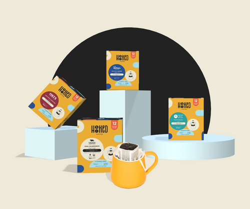 An assortment of visually appealing Hooked Coffee Collection packages, showcasing a diverse range of carefully curated coffee blends and flavors