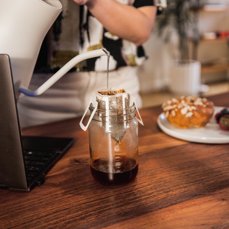 Brewing coffee at home using single serve pour over coffee pouch