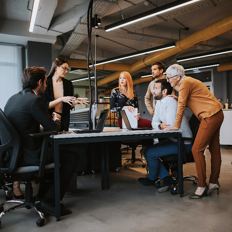 Employees in the team meeting in a corporate office